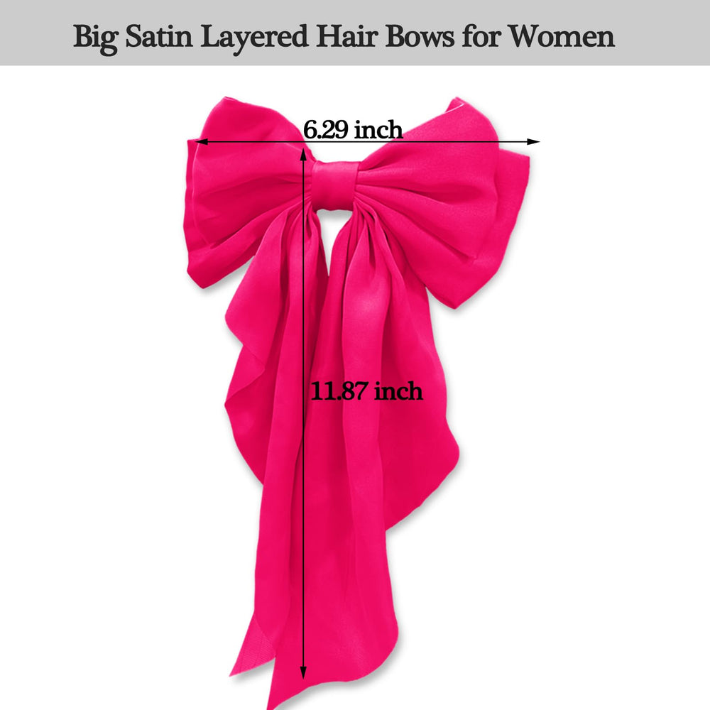 illpta bow next to hand showing scale and easy-to-wear size