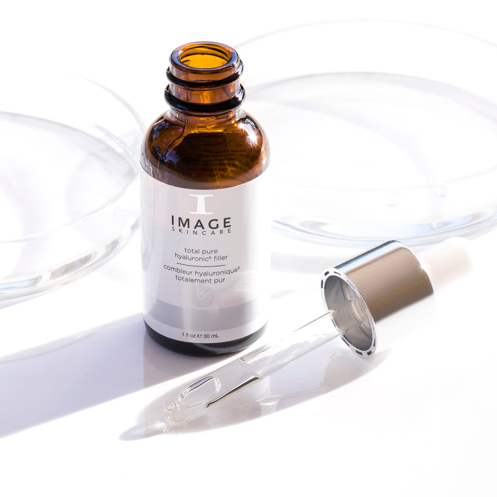 IMAGE Skincare 1 fl oz bottle shown with scale for size and portability
