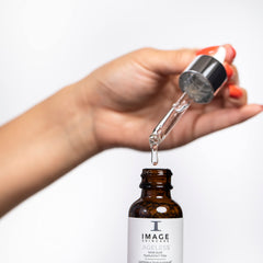 IMAGE Skincare close-up of silky serum texture demonstrating fast absorption