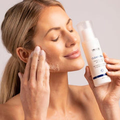 IMAGE Skincare on bathroom shelf in lifestyle scene conveying daily routine benefit