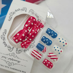 IMPOBLNS close-up of flag and star nail art showcasing crisp printed details and vibrant colors