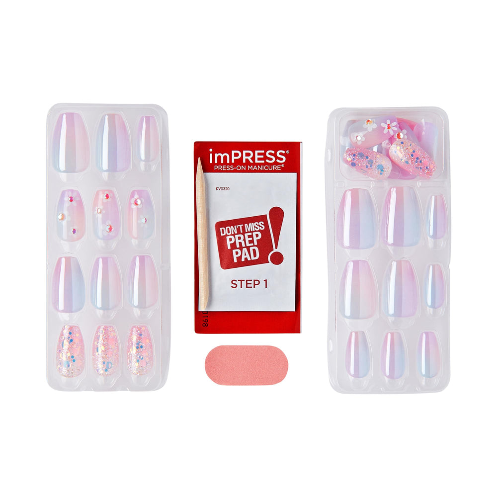 imPRESS nails held in hand to show scale and practical length for comfortable wear