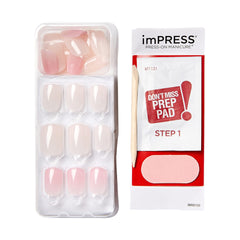 imPRESS nail on finger beside a coin showing scale and short wearable length