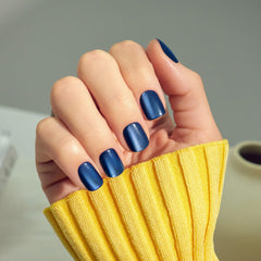 imPRESS top view of all 30 short squoval nails arranged for size selection