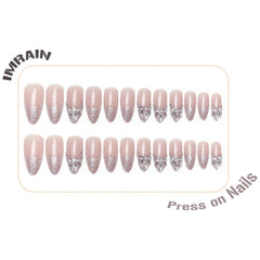 IMRAIN nails held in hand for scale, helps visualize real-life length and fit