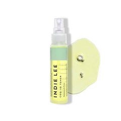 Indie Lee front bottle shot showing clear label and travel-friendly size