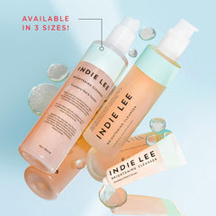 Indie Lee with strawberries and sunflower highlighting antioxidant ingredients