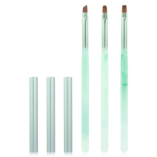 INENK front view of brush set showing green handles and protective caps for neat storage