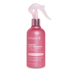 Infusion K bottle on bathroom vanity styled scene showing everyday use and salon-quality finish