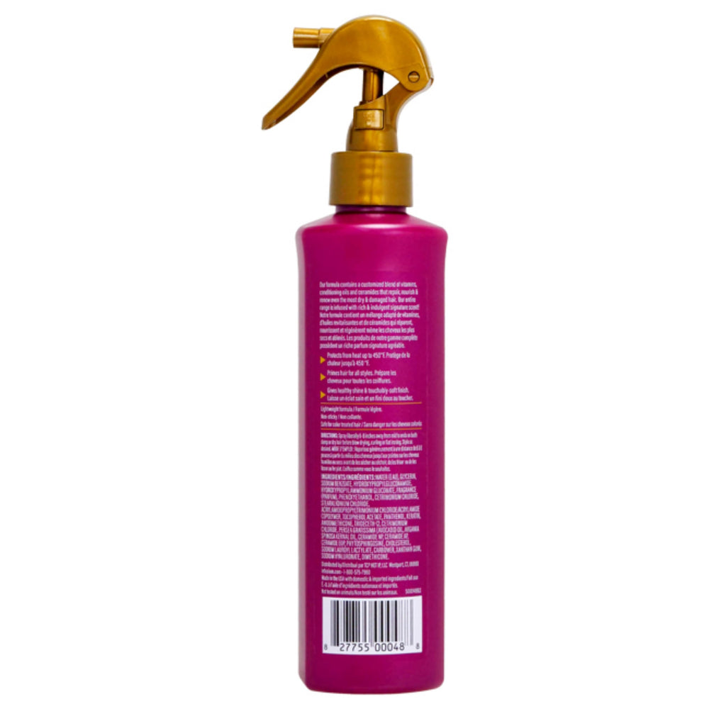 Infusium spray being applied to damp hair, demonstrating even protection and moisture