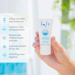 Inis shea butter hand cream held in hand to show travel size convenience