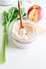 INNERSENSE applying scrub to scalp demonstrating gentle pre-wash use