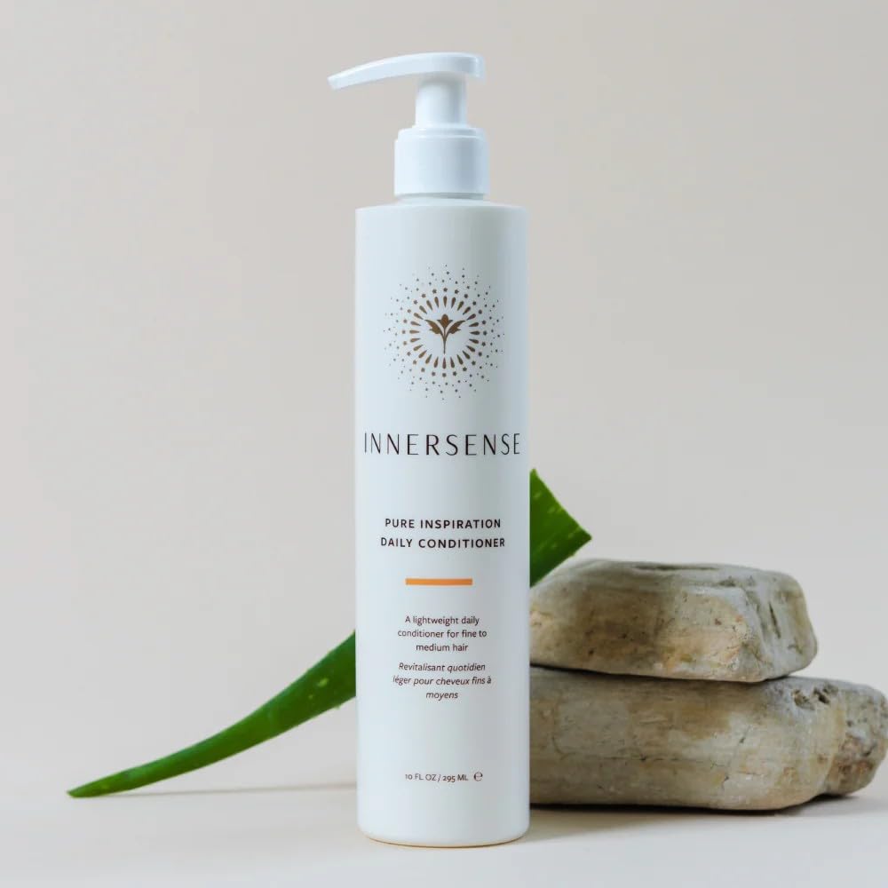 INNERSENSE duo staged in bathroom with styling tools to illustrate volumizing routine benefits