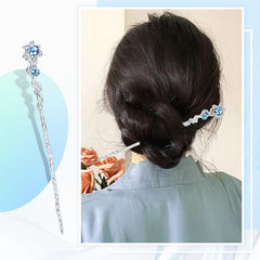 inSowni hair stick inserted in bun demonstrating secure hold and vintage styling
