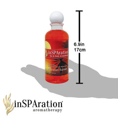 InSPAration 217X bottle beside a hot tub creating tropical spa ambiance