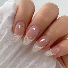 IQXGE close-up of rhinestones and gold glitter adding sparkle and luxe detail