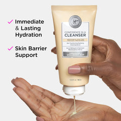 IT Cosmetics travel tube in hand showing size and portability benefit