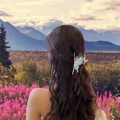 ITingstere clip held in hand showing size scale and coverage for thick hair benefit