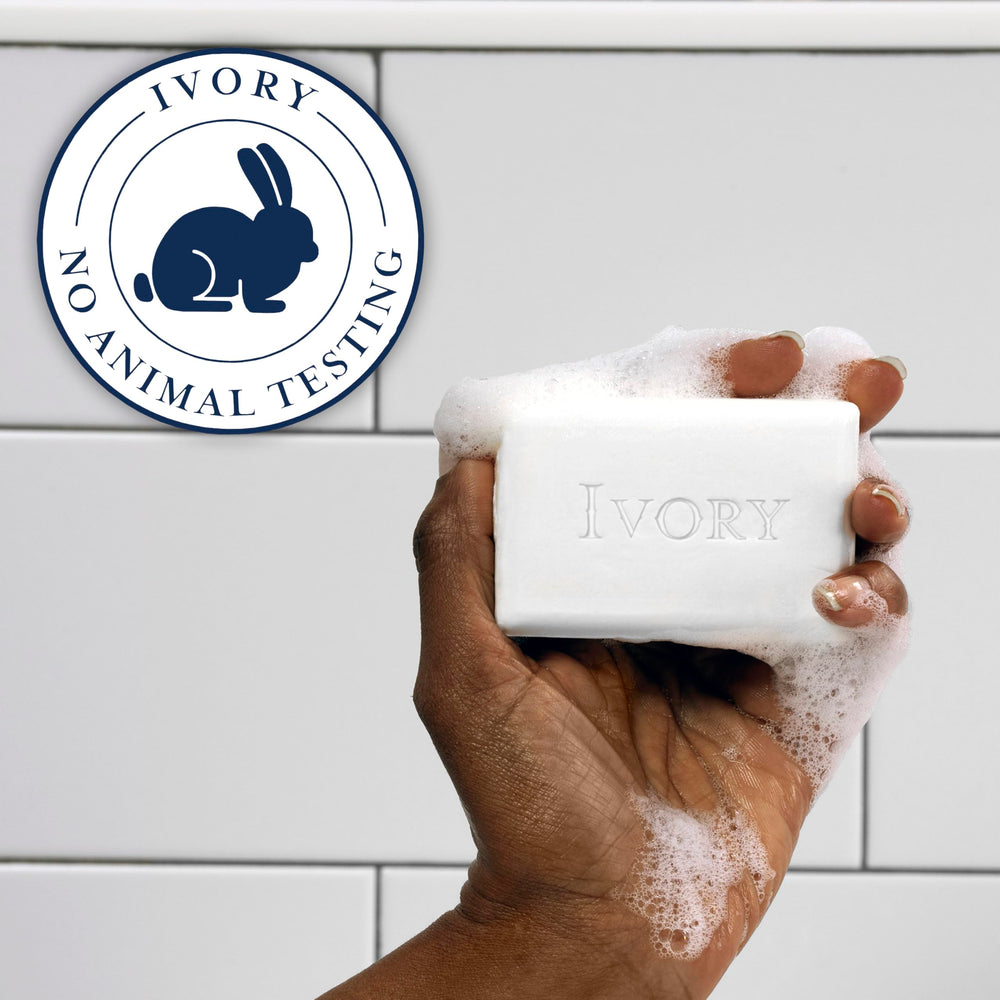 Ivory aloe size comparison in hand showing compact 3.17 oz travel-friendly bar