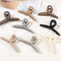 ivyu close-up of interlocking teeth and metal spring, secure strong hold