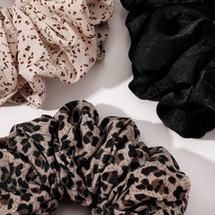 Ivyu scrunchie in a high ponytail demonstrating secure hold without creases