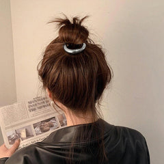 Ivyu cuff finishing a low bun showing tidy look and everyday style benefit