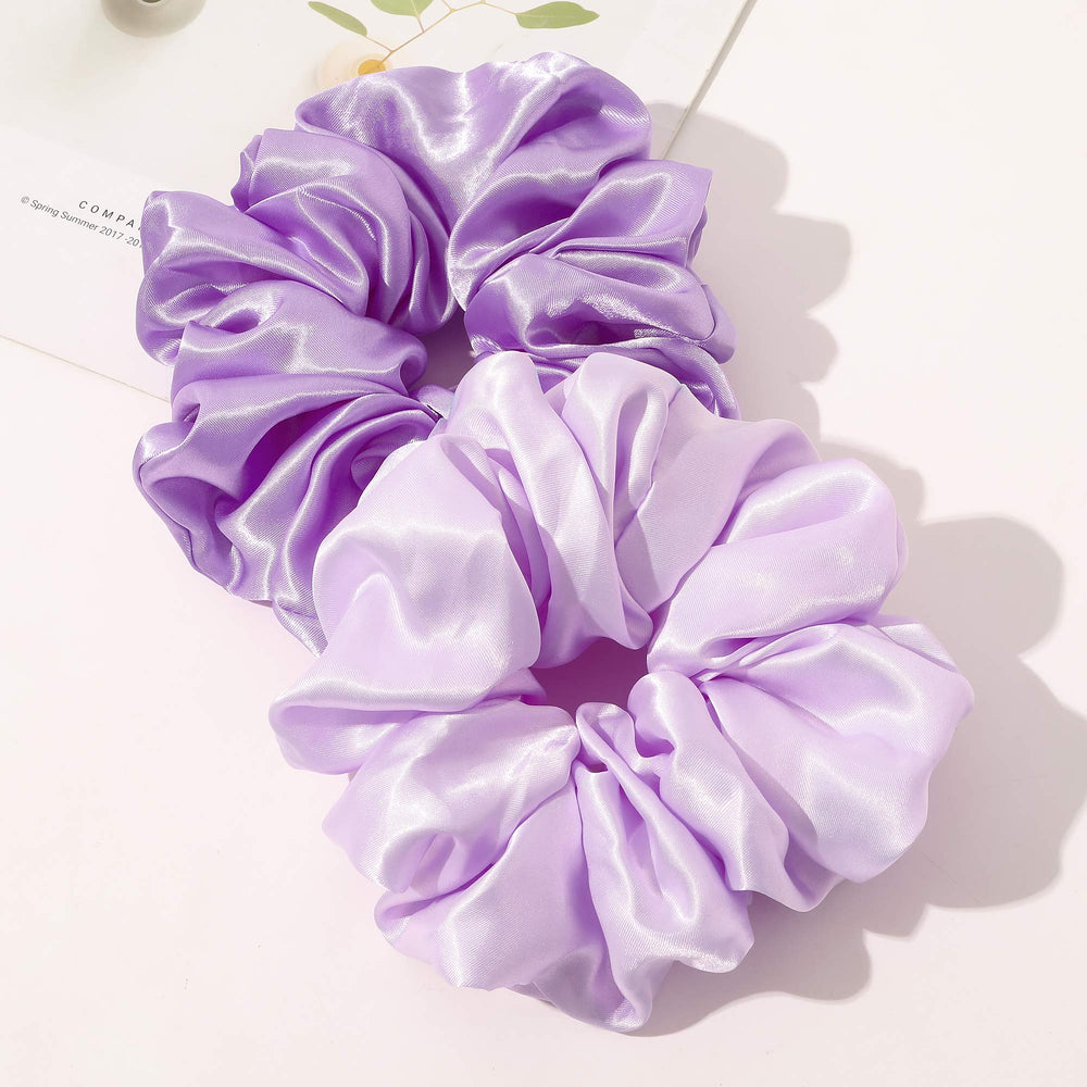 Ivyu scrunchie securing a thick ponytail with stable hold and no slipping