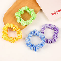 Ivyu scrunchie worn on wrist as accessory and quick-hair solution