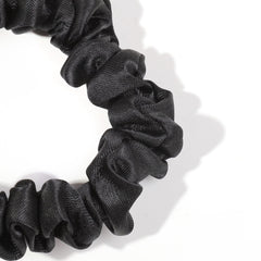 Ivyu scrunchies arranged on vanity, offering a polished accessory display