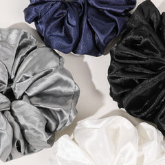 Ivyu scrunchie on wrist to show size and portability for on-the-go use