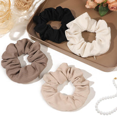 Ivyu scrunchie worn on wrist illustrating hands-free carry benefit