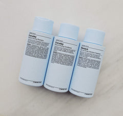 J Beverly Hills bottle staged in shower scene indicating refreshing eucalyptus wash experience