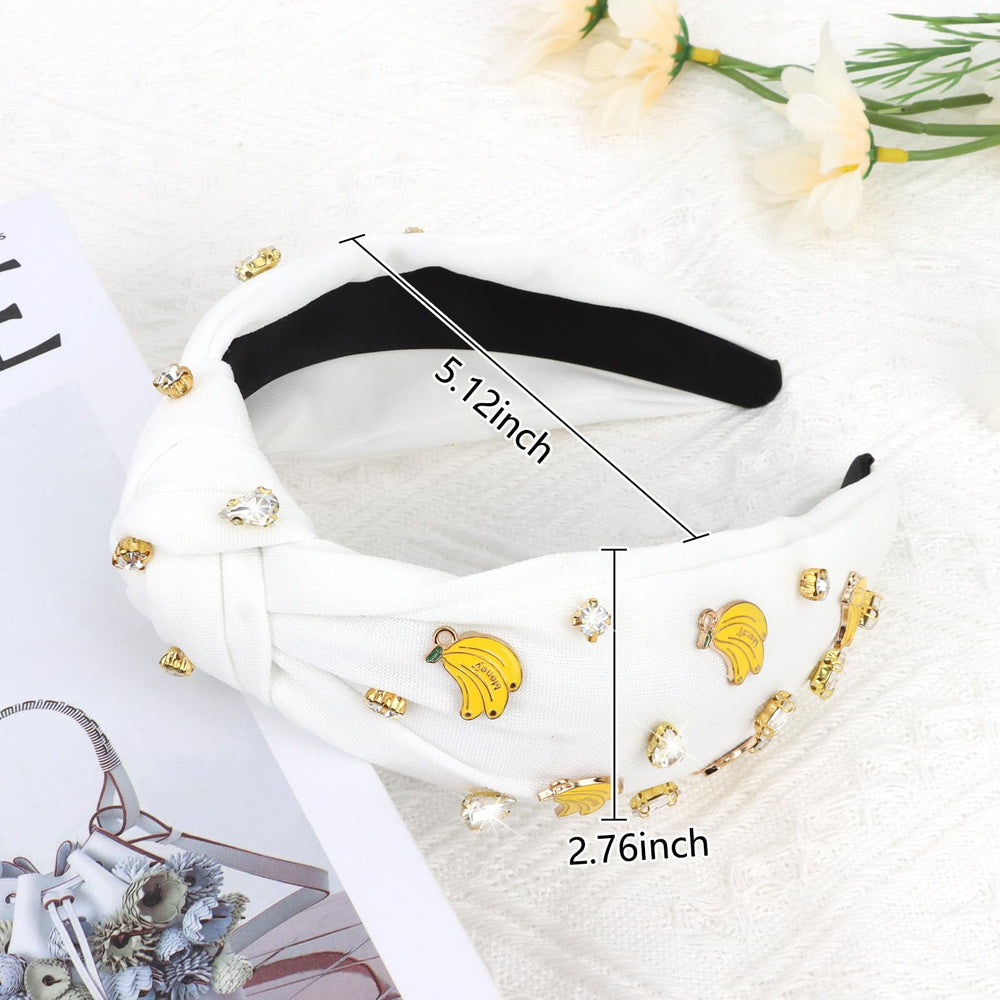 Jaciya headband next to ruler showing 2.76 inch wide coverage