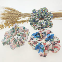 Jaczora scrunchie worn on wrist as accessory, easy everyday styling benefit