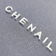 Jaliya glitter-filled resin letters close-up highlighting sparkle and color options