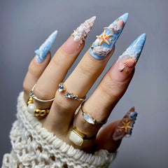 Jaliya finished summer manicure with ocean charms, seaside-inspired nail styling