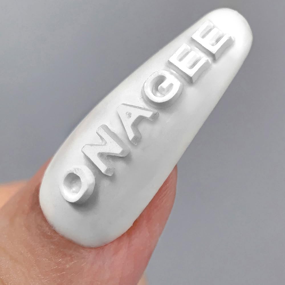 Jaliya mold beside ruler to show mini dimensions for precise scale
