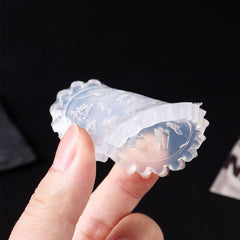 Jaliya removing finished ocean charms from mold, simple demolding benefit