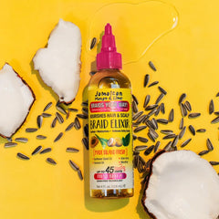 Jamaican Mango & Lime bottle in hand for scale showing compact travel-friendly size