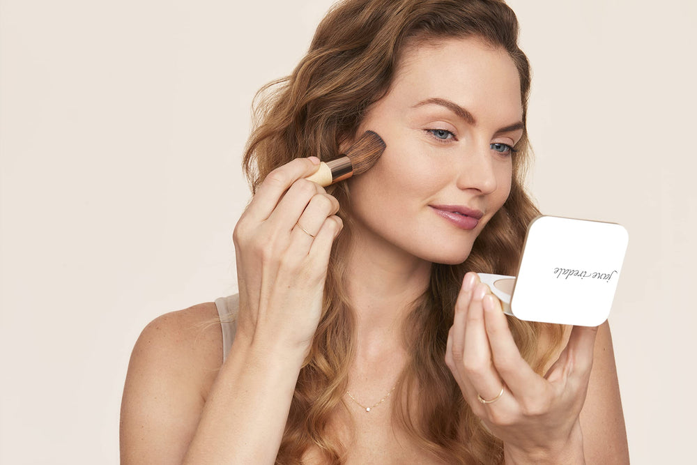 jane iredale botanical ingredients display including pomegranate and pine bark suggesting antioxidant benefits