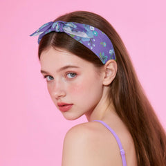 Jaqakid close-up of knotted bow detail highlighting feminine accent