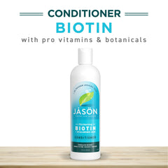 JASON bottle beside comb and towel to show product scale