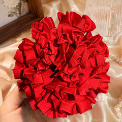 JazSwirl scrunchie worn in a high ponytail adding visible volume benefit