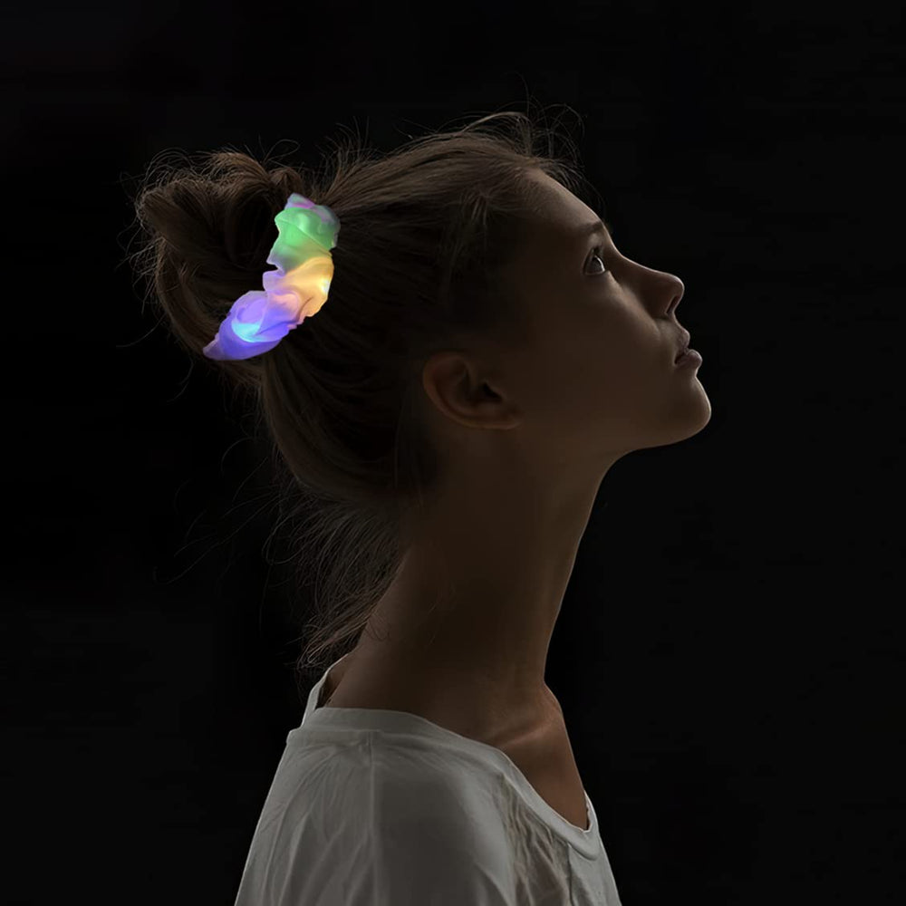 jeffan scrunchie glowing at a party illustrating festive neon impact