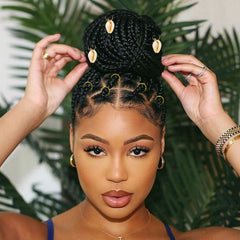 Jelyne spring coils and hoop rings beside ruler for size reference and styling options