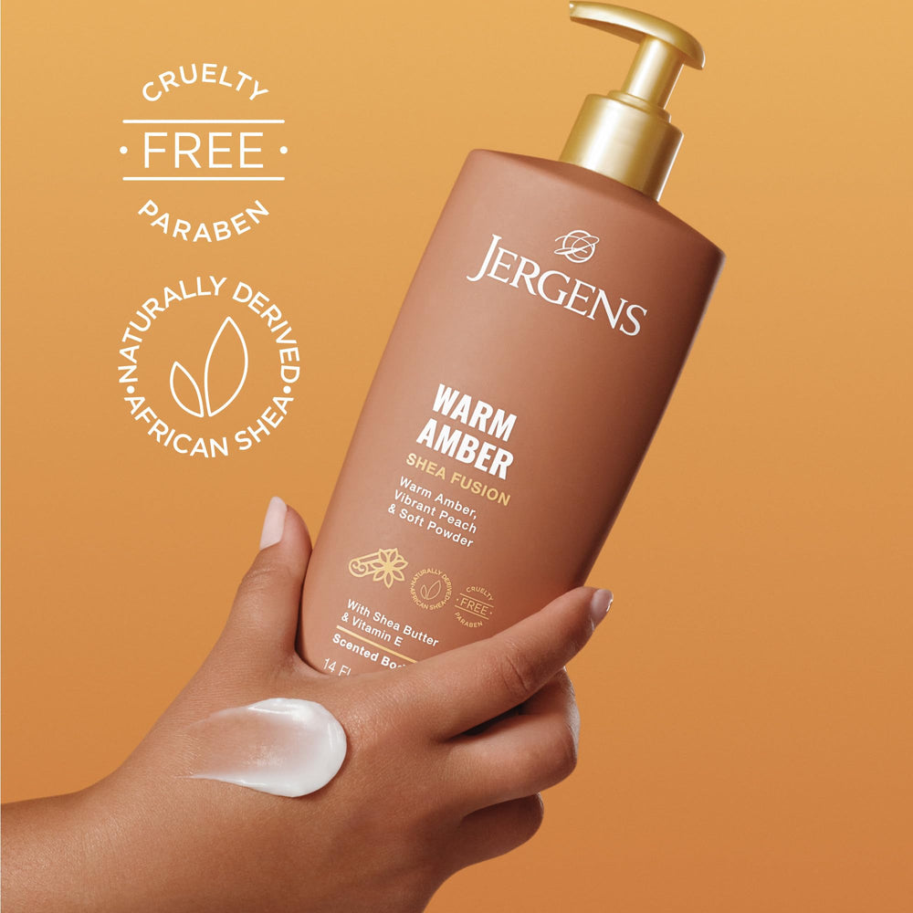 Hand applying Jergens lotion to forearm for touchably smooth skin