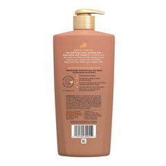 Shea butter and peach still life with Jergens bottle conveying nourishing scent