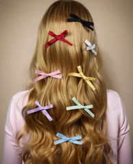 JGQUR bow clip worn in a half-up hairstyle showing instant styling benefit