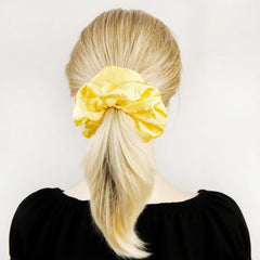 JGQUR scrunchie paired with an outfit showing stylish accessory coordination