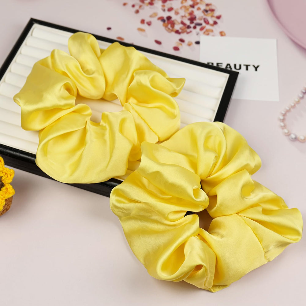 JGQUR scrunchie on a pillow illustrating comfortable overnight hair protection